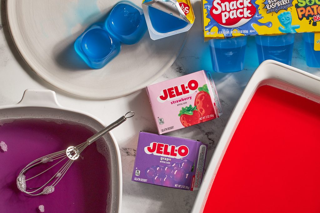 sour patch jell-o strawberry jell-o grape jell-o in a baking dish