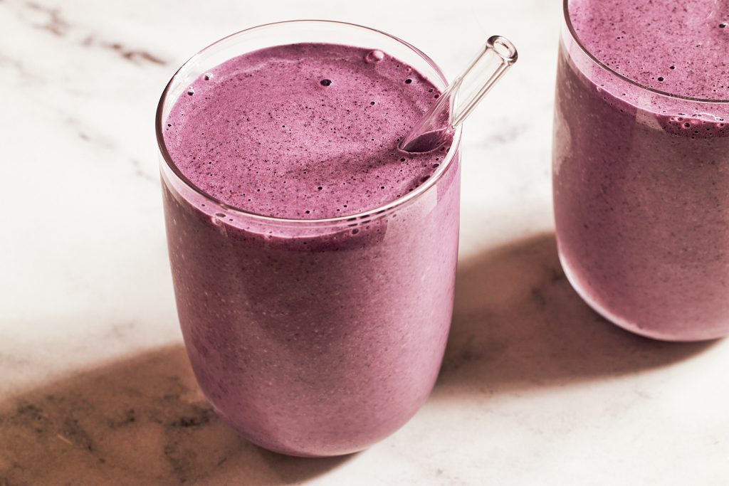 blueberry smoothie heated rivalry straw and berry