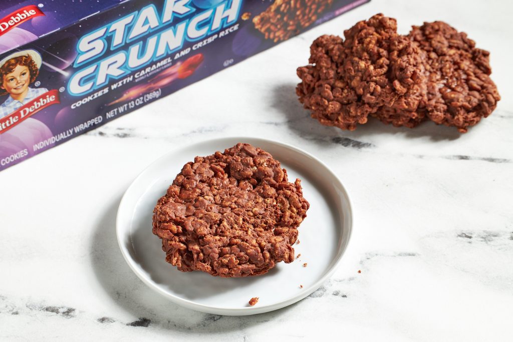 homemade star crunch on white surface with star crunch box in the background